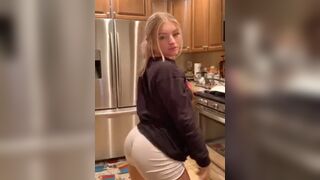 hot blonde jiggling her ass in the kitchen