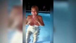unhinged teen jumps into pool topless